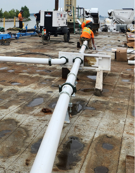 Concrete pump pipe riser installed on an Indian jobsite